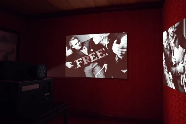 Enjoy classic public domain movies free from a vintage projector in a cozy environment.